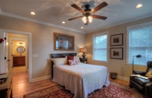 Master bedroom with queen bed on main level